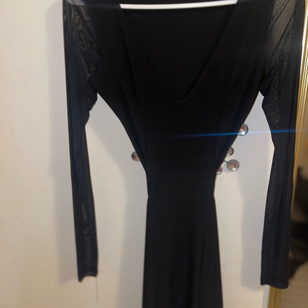 Black dress lower back out